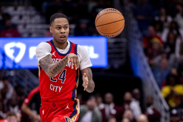 Oct 23, 2024; New Orleans, Louisiana, USA; New Orleans Pelicans guard Jordan Hawkins (24) passes the ball against the Chicago Bulls during the second half at Smoothie King Center.