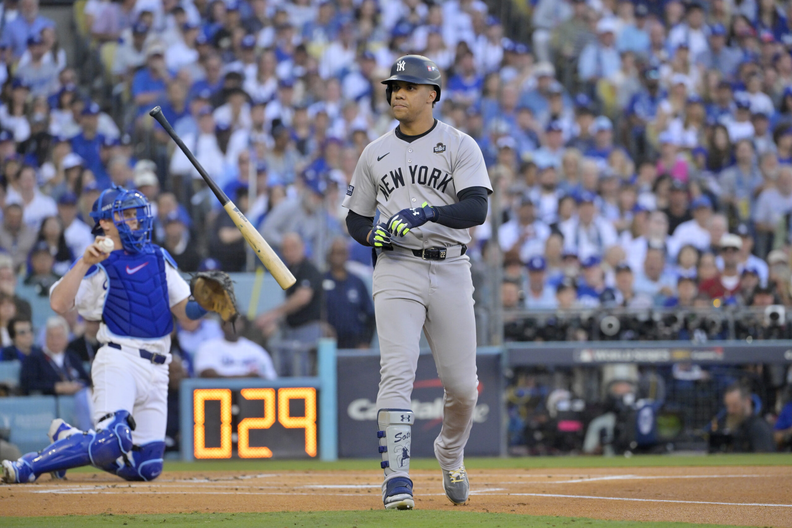 Oct 25, 2024; Los Angeles, California, USA; New York Yankees outfielder Juan Soto (22) reacts after a walk in the first inning against the Los Angeles Dodgers during game one of the 2024 MLB World Series at Dodger Stadium. Mandatory Credit: Jayne Kamin-Oncea-Imagn Images