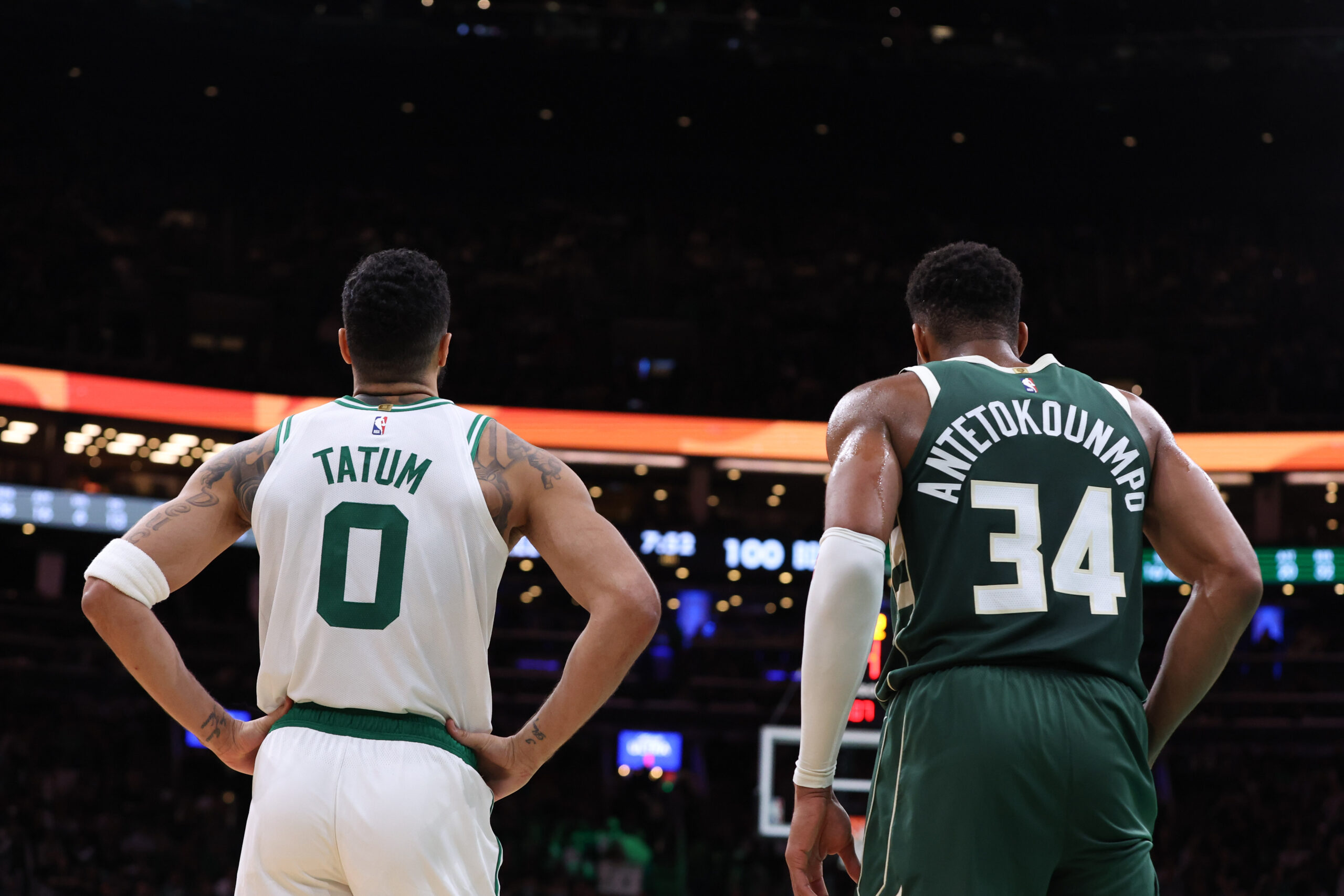 Oct 28, 2024; Boston, Massachusetts, USA; Boston Celtics forward Jayson Tatum (0) and Milwaukee Bucks forward Giannis Antetokounmpo (34) look on during the second half at TD Garden.