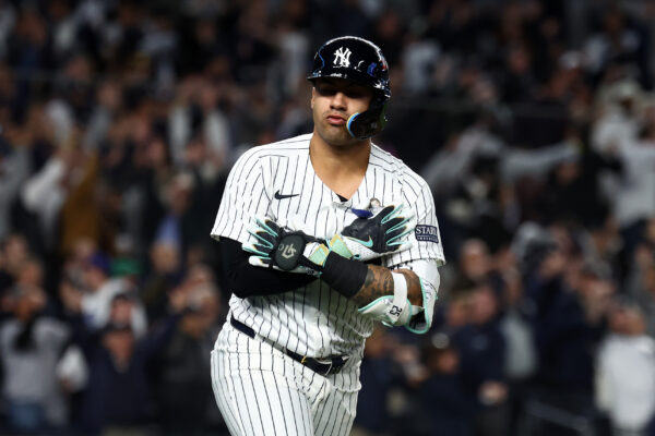 Oct 29, 2024; Bronx, New York, USA; New York Yankees second baseman Gleyber Torres (25) reacts after hitting a three run home run against the Los Angeles Dodgers in the eighth inning during game four of the 2024 MLB World Series at Yankee Stadium. Mandatory Credit: Vincent Carchietta-Imagn Images