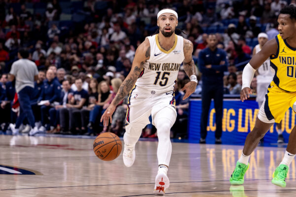 Nov 1, 2024; New Orleans, Louisiana, USA; New Orleans Pelicans guard Jose Alvarado (15) brings the ball up court against Indiana Pacers guard Bennedict Mathurin (00) during the first half at Smoothie King Center.