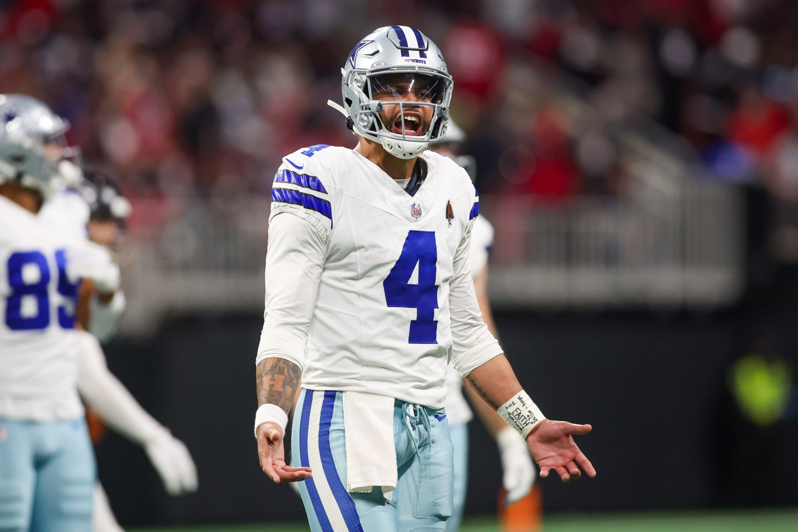 Nov 3, 2024; Atlanta, Georgia, USA; Dallas Cowboys quarterback Dak Prescott (4) reacts to a penalty against the Atlanta Falcons in the third quarter at Mercedes-Benz Stadium. Mandatory Credit: Brett Davis-Imagn Images