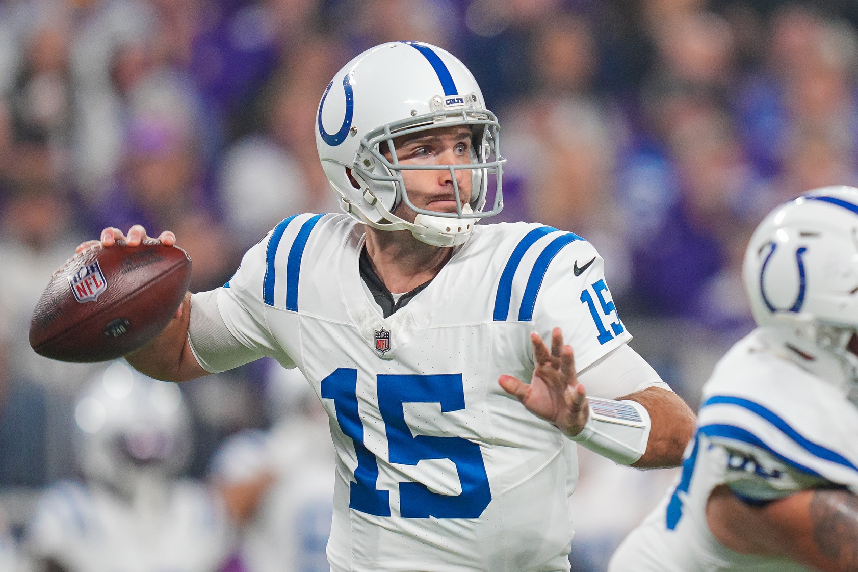 Nov 3, 2024; Minneapolis, Minnesota, USA; Indianapolis Colts quarterback Joe Flacco (15) passes against the Minnesota Vikings in the first quarter at U.S. Bank Stadium. Mandatory Credit: Brad Rempel-Imagn Images