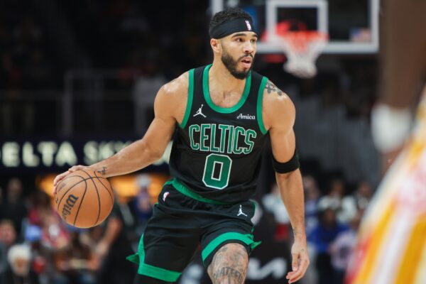 Nov 4, 2024; Atlanta, Georgia, USA; Boston Celtics forward Jayson Tatum (0) handles the ball against the Atlanta Hawks in the first quarter at State Farm Arena.