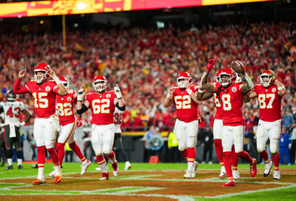 Nov 4, 2024; Kansas City, Missouri, USA; Kansas City Chiefs wide receiver DeAndre Hopkins (8) celebrates with teammates after scoring a touchdown during the first half against the Tampa Bay Buccaneers at GEHA Field at Arrowhead Stadium.