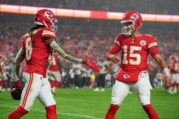 Nov 4, 2024; Kansas City, Missouri, USA; Kansas City Chiefs wide receiver DeAndre Hopkins (8) celebrates with quarterback Patrick Mahomes (15) after scoring against the Tampa Bay Buccaneers during the second half at GEHA Field at Arrowhead Stadium. Mandatory Credit: Denny Medley-Imagn Images