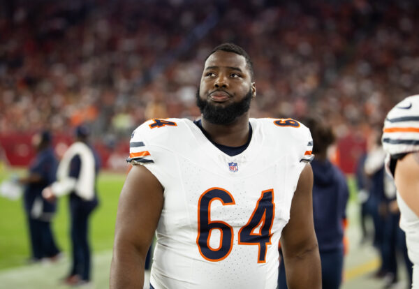 Nov 3, 2024; Glendale, Arizona, USA; Chicago Bears guard Nate Davis (64) against the Arizona Cardinals at State Farm Stadium. Mandatory Credit: Mark J. Rebilas-Imagn Images