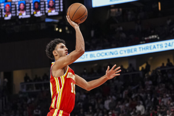 Nov 6, 2024; Atlanta, Georgia, USA; Atlanta Hawks forward Zaccharie Risacher (10) shoots against the New York Knicks during the second half at State Farm Arena.