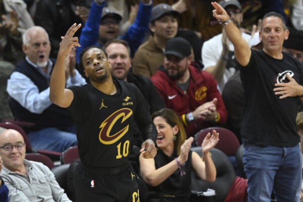 Nov 8, 2024; Cleveland, Ohio, USA; Cleveland Cavaliers guard Darius Garland (10) celebrates a three-point basket in the fourth quarter against the Golden State Warriors at Rocket Mortgage FieldHouse.